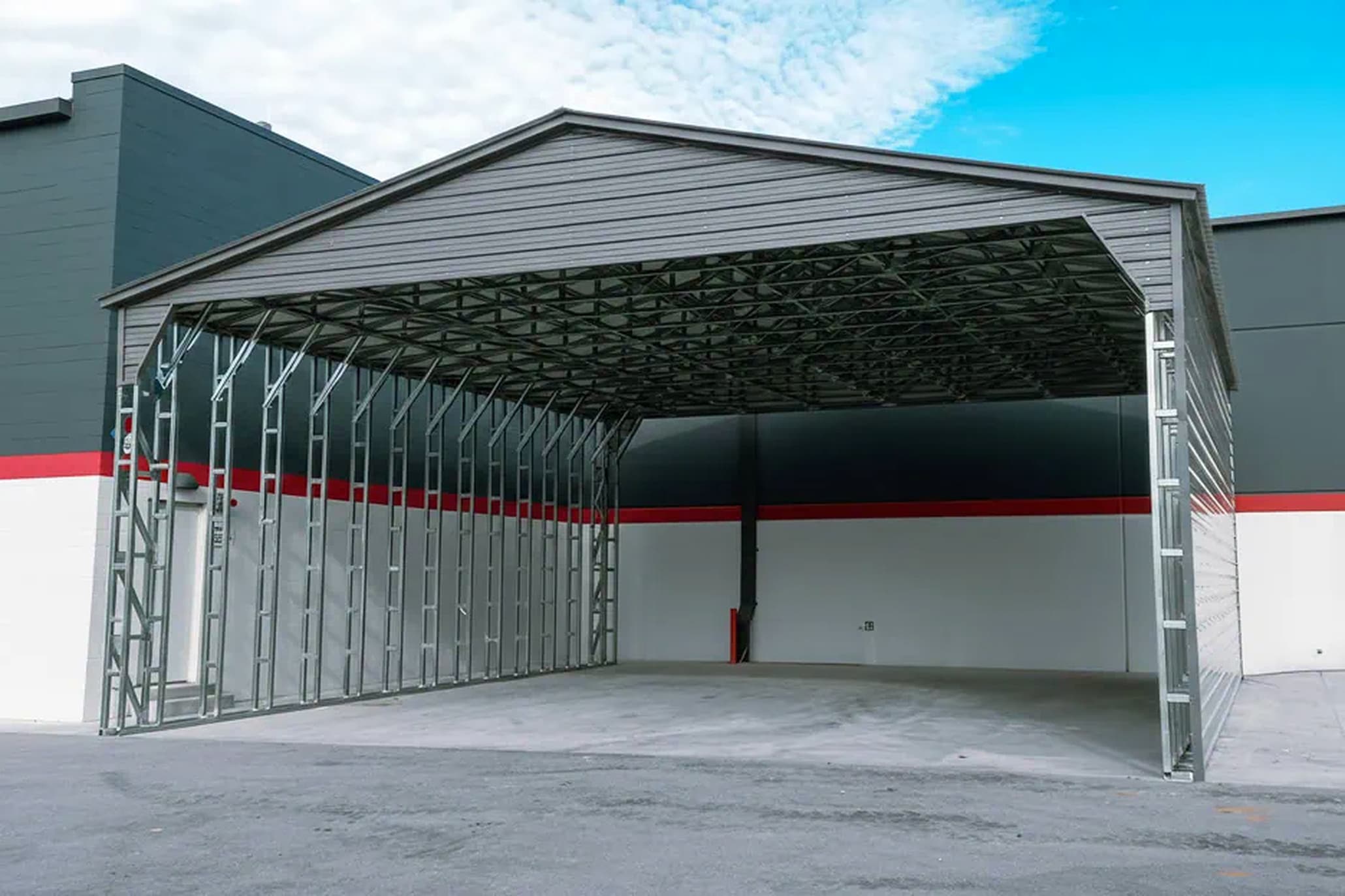 Triton Industries crew installing a large commercial metal building